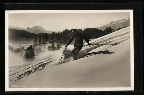 AK Skifahrer fährt rasant den Berg hinab