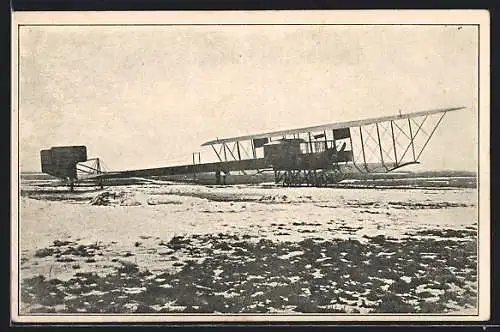 AK Flugzeug auf einer verschneiten Wiese