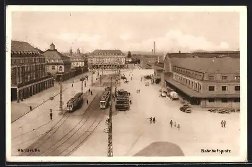 AK Karlsruhe, Bahnhofsplatz mit Strassenbahnen