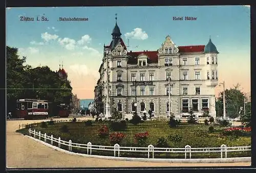AK Zittau i. Sa., Bahnhofstrasse mit Strassenbahn und Hotel Hütter