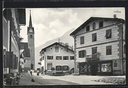 AK Golling /Salzach, Strassenpartie mit Blick zur Kirche, Geschäft von Nikolaus Dietrich