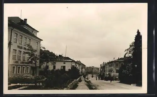 AK Mauerkirchen /O. Ö., Strassenpartie an der Hauptschule