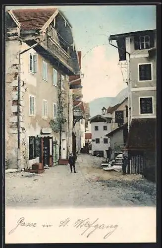 AK St. Wolfgang, Knabe in einer Gasse