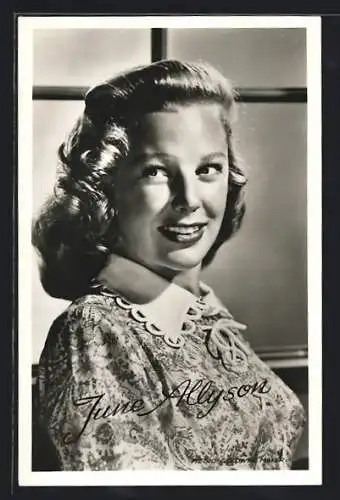 AK Schauspielerin June Allyson über Schulter schauend