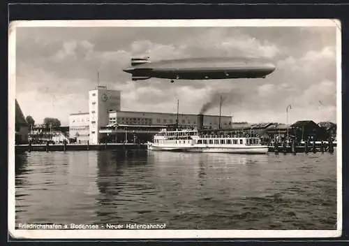 AK Friedrichshafen a. Bodensee, LZ 127 Graf Zeppelin über dem neuen Hafenbahnhof