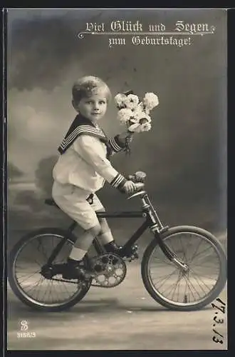 AK Junge im Matrosenanzug auf einem Fahrrad