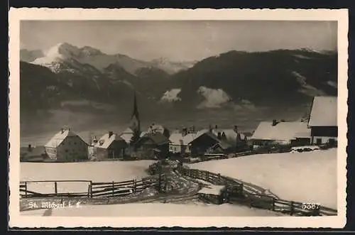 AK St. Michael i. L., Teilansicht mit Kirche im Schnee