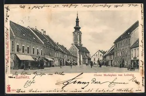 AK Leibnitz, Oberer Marktplatz mit Geschäften und Kirche