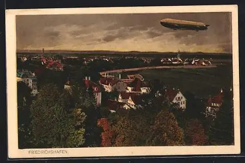 AK Friedrichshafen i. B., Zeppelin über den Dächern der Stadt