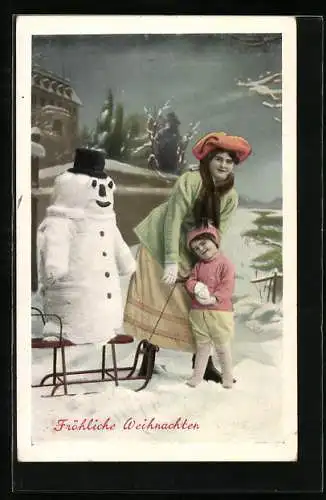 AK Mutter und Kind mit Schneemann auf einem Schlitten