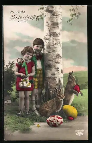 AK Osterhasen und Kinder mit Eiern am Wegesrand