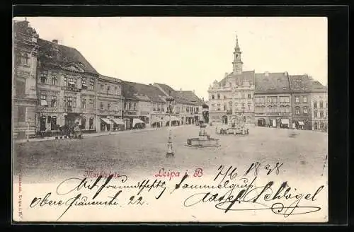 AK Leipa i. B., Marktplatz mit Brunnen und Denkmal
