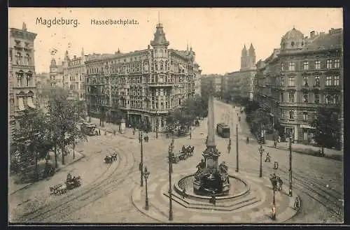 AK Magdeburg, Strassenbahn am Hasselbachplatz nebst Denkmal
