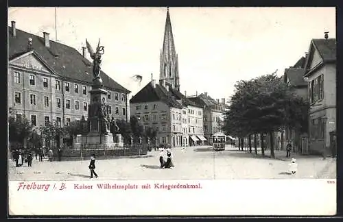 AK Freiburg / Breisgau, Kaiser Wilhelmsplatz mit Kriegerdenkmal, Strassenbahn