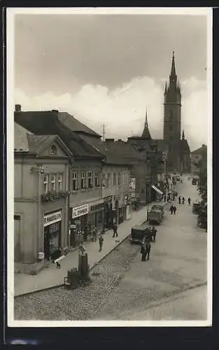 AK Tschaslau / Caslav, Cást Zizkova námesti, Partie mit Geschäften