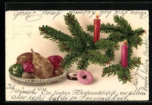 AK Gabenteller mit Lebkuchen vor Kerzen auf Ästen eines Nadelbaums