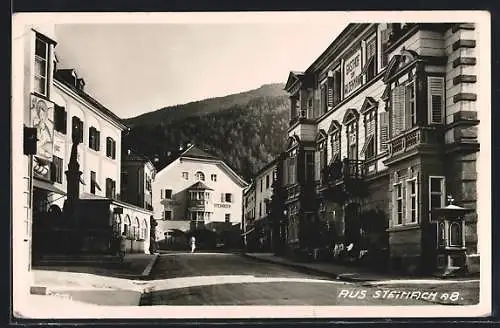 AK Steinach, Strassenpartie mit Hotel Steinbock und Gasthof zum wilden Mann