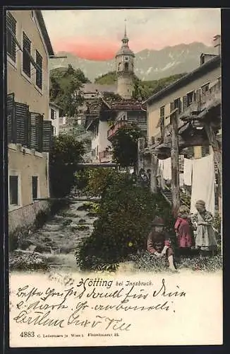 AK Hötting bei Innsbruck, Häuser am Fluss, Blick zum Kirchturm
