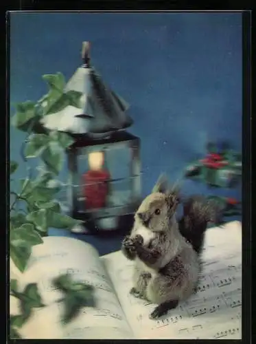 3D-AK Eichhörnchen sitzt auf Notenblättern