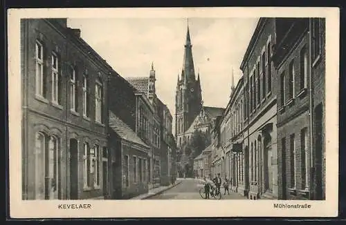 AK Kevelaer, Mühlenstrasse mit Geschäft und Kirche