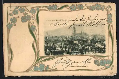 Präge-AK Freiburg / Breisgau, Teilansicht mit Kirche, Vergissmeinnicht, Passepartout