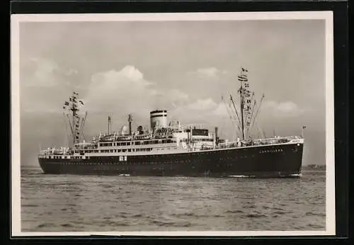 AK Passagierschiff Cordillera in Flaggengala auf hoher See