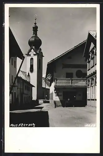 AK Flirsch, Strassenpartie mit Gasthaus zum Löwen und Kirche