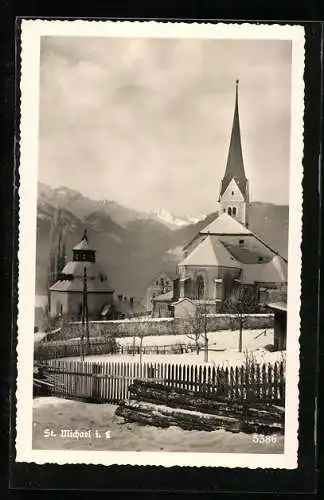 AK St. Michael i. L., Ortspartie mit Kirche im Winter