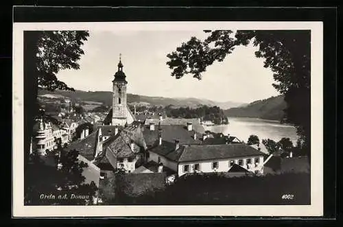 AK Grein a. d. Donau, Ortspartie mit Kirche und Blick übers Wasser