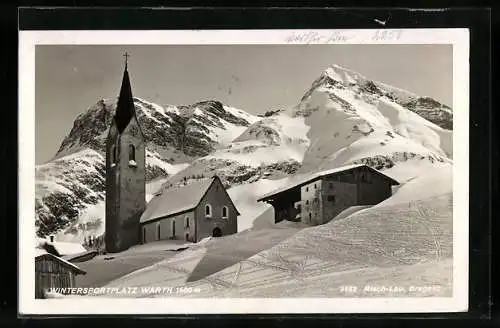 AK Warth /Vorarlberg, Ortspartie mit Kirche im Schnee