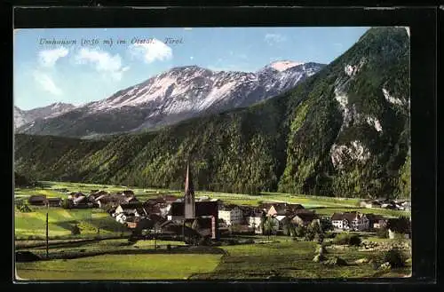 AK Umhausen, Blick auf Ort mit Bergkulisse