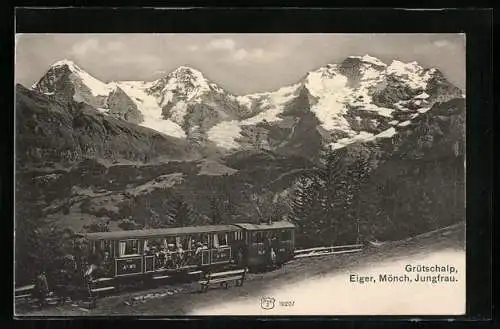 AK Grütschalp, Ortspartie mit Bergbahn, Eiger, Mönch und Jungfrau