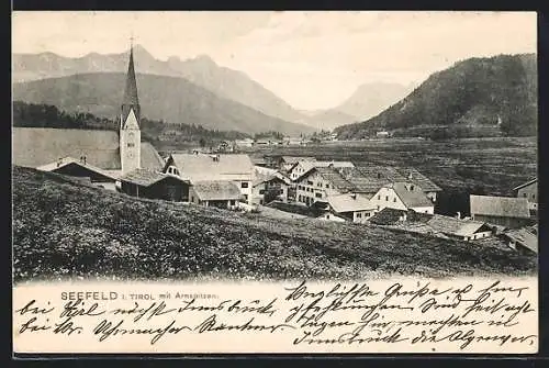 AK Seefeld /Tirol, Teilansicht mit Kirche und Arnspitzen