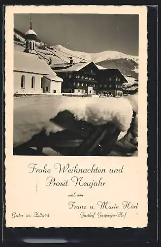 AK Gerlos im Zillertal, Der Gasthof Gaspinger Hof neben der Kirche im Schnee, Weihnachts- und Neujahrskarte