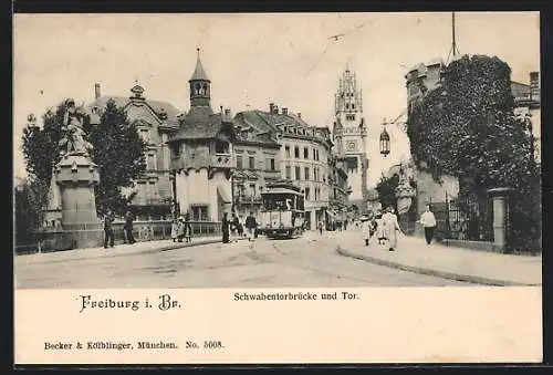 AK Freiburg i. Br., Schwabentorbrücke mit Strassenbahn und Tor