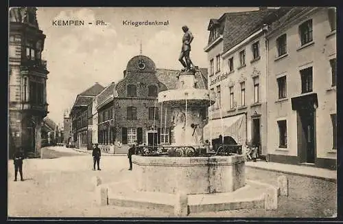 AK Kempen /Rh., Kriegerdenkmal vor Handlung Josef Klefisch
