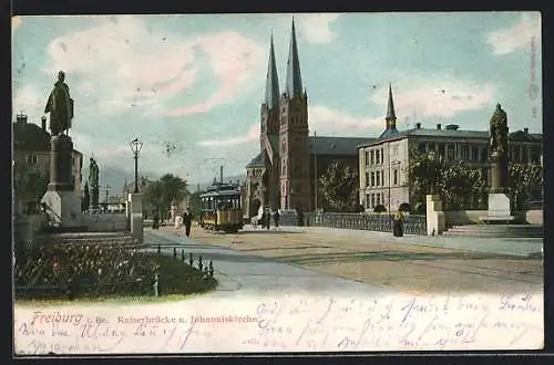 AK Freiburg i. Br., Strassenbahn auf der Kaiserbrücke mit Johanniskirche