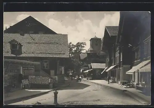 AK Adelboden, Strassenpartie mit den Kiosks Grand-Bazar und Bazar-Central