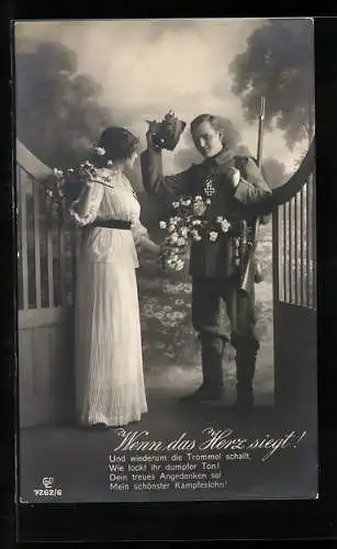 Künstler-AK Soldat mit Eisernem Kreuz begrüsst seine Braut