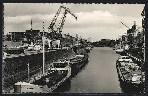 AK Neuss am Rhein, Hafenpartie mit Frachtern