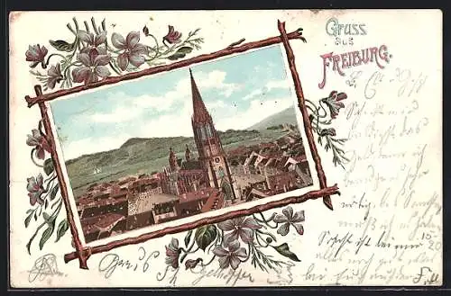 Lithographie Freiburg / Breisgau, Ortsansicht mit dem Münster, im floralen Passepartout
