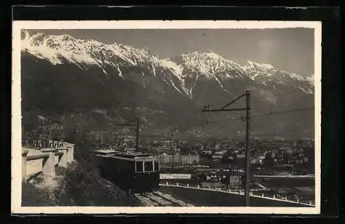 AK Innsbruck, Ortsansicht mit Stubaitalbahn und Alpen
