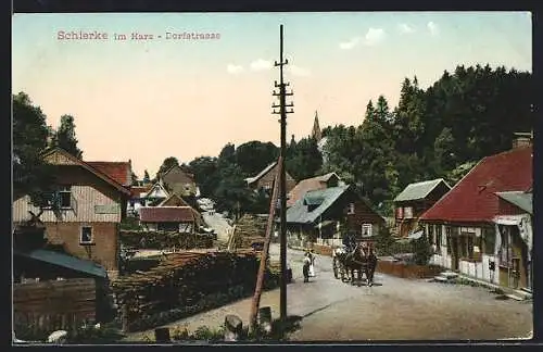 AK Schierke /Harz, Dorfstrasse mit Kirchturm
