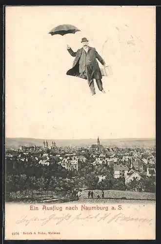 AK Naumburg a. S., Mann fliegt mit Regenschirm über den Ort hinweg