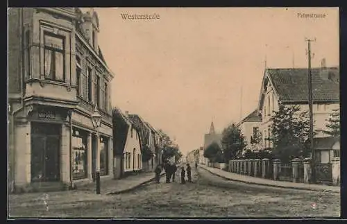 AK Westerstede, Peterstrasse mit Kaffeegeschäft und Turmblick