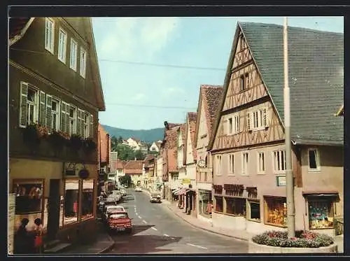 AK Amorbach /Odw., Strassenpartie mit Geschäften und Autos