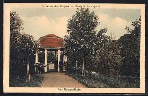 AK Bad Mergentheim, Partie aus dem Kurpark mit König Wilhelmsquelle