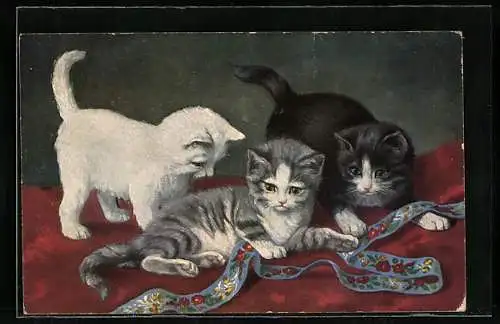 AK Mit einem Zierband spielende junge Katzen