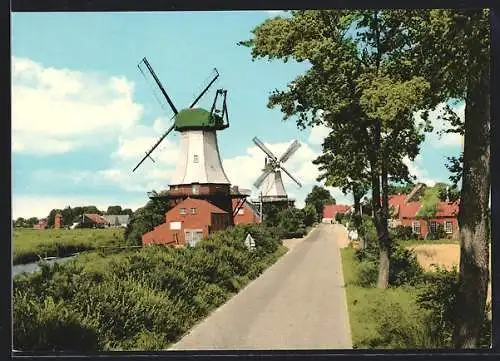 AK Greetsiel /Nordsee, Die Windmühlen am Kanal