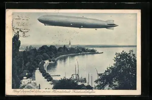 AK Friedrichshafen, Luftschiff Graf Zeppelin über seiner Heimatstadt